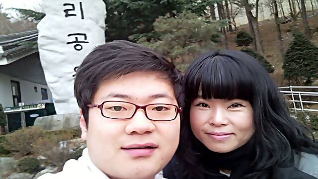 Amateur Korean couple fucks in classic missionary position on camera