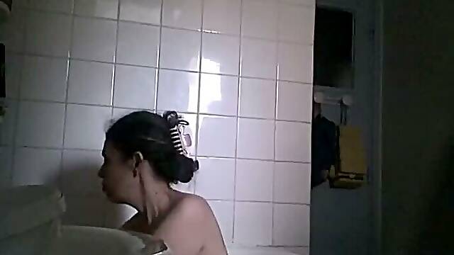 Big boobed stepmom spied in the bathroom